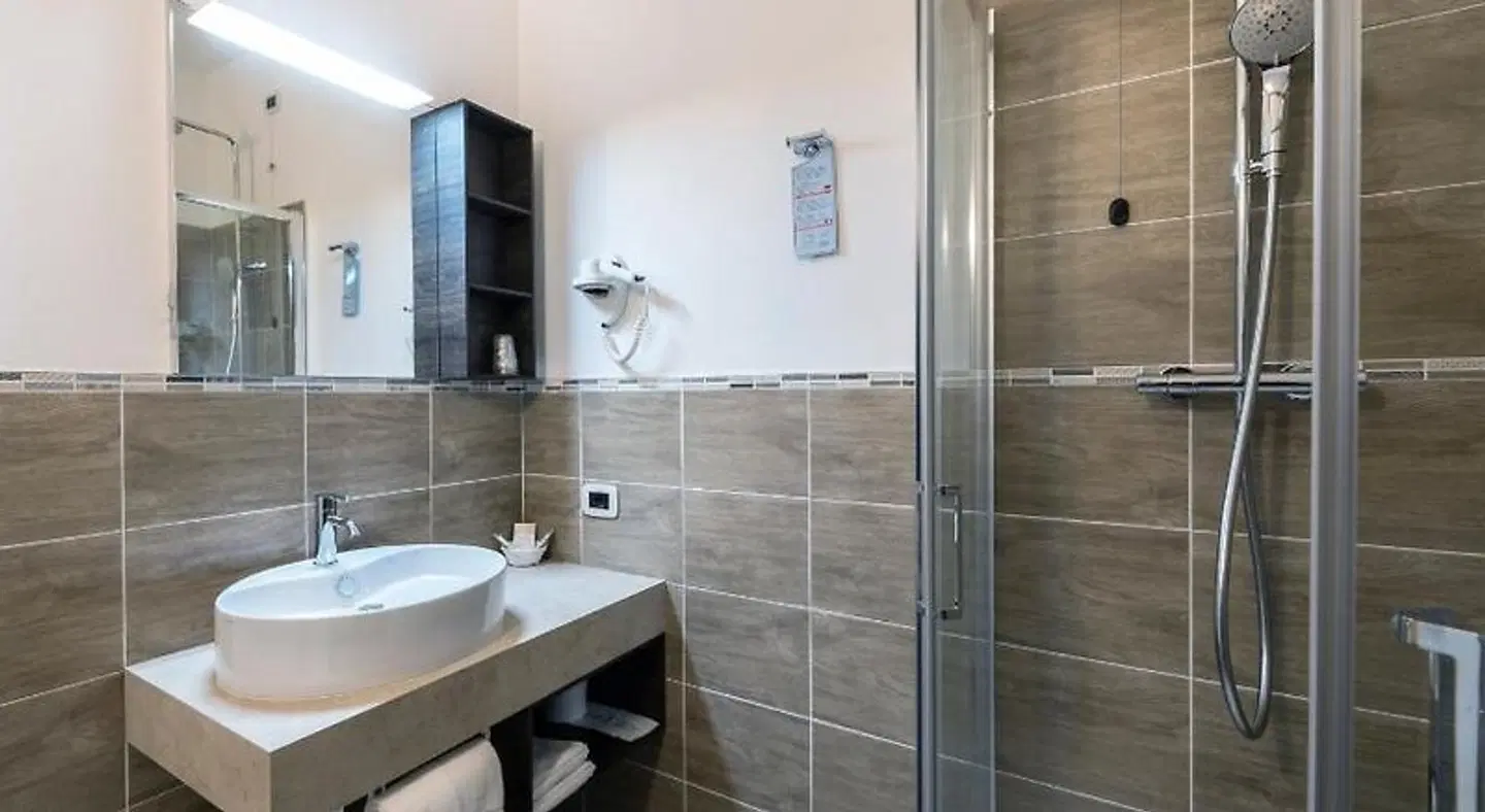 Hotel Garni Corona Badezimmer