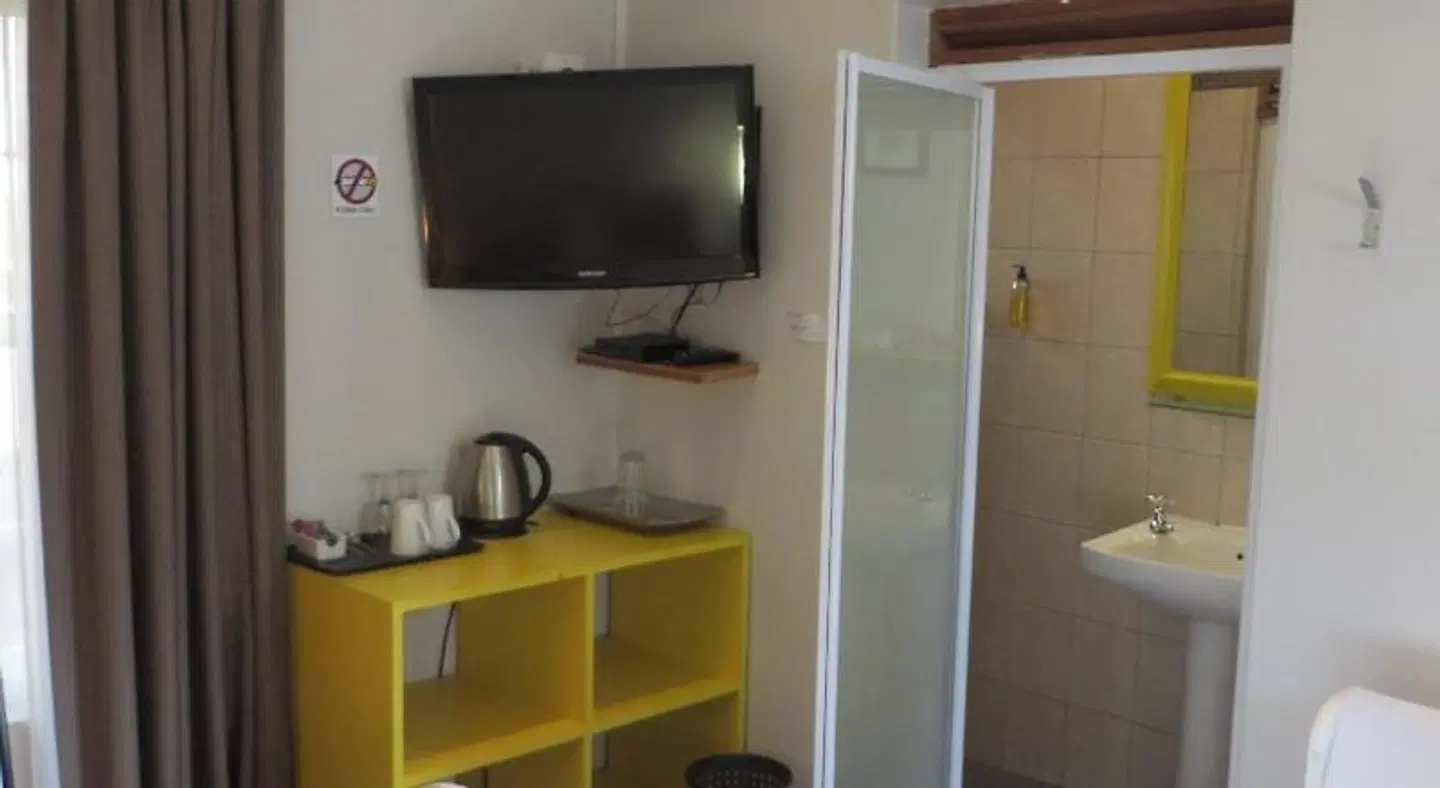 Ashanti Lodge Gardens Badezimmer