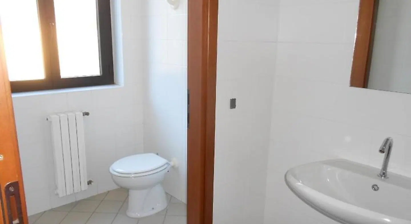 Lake Como Beach Lodge & Hostel Badezimmer