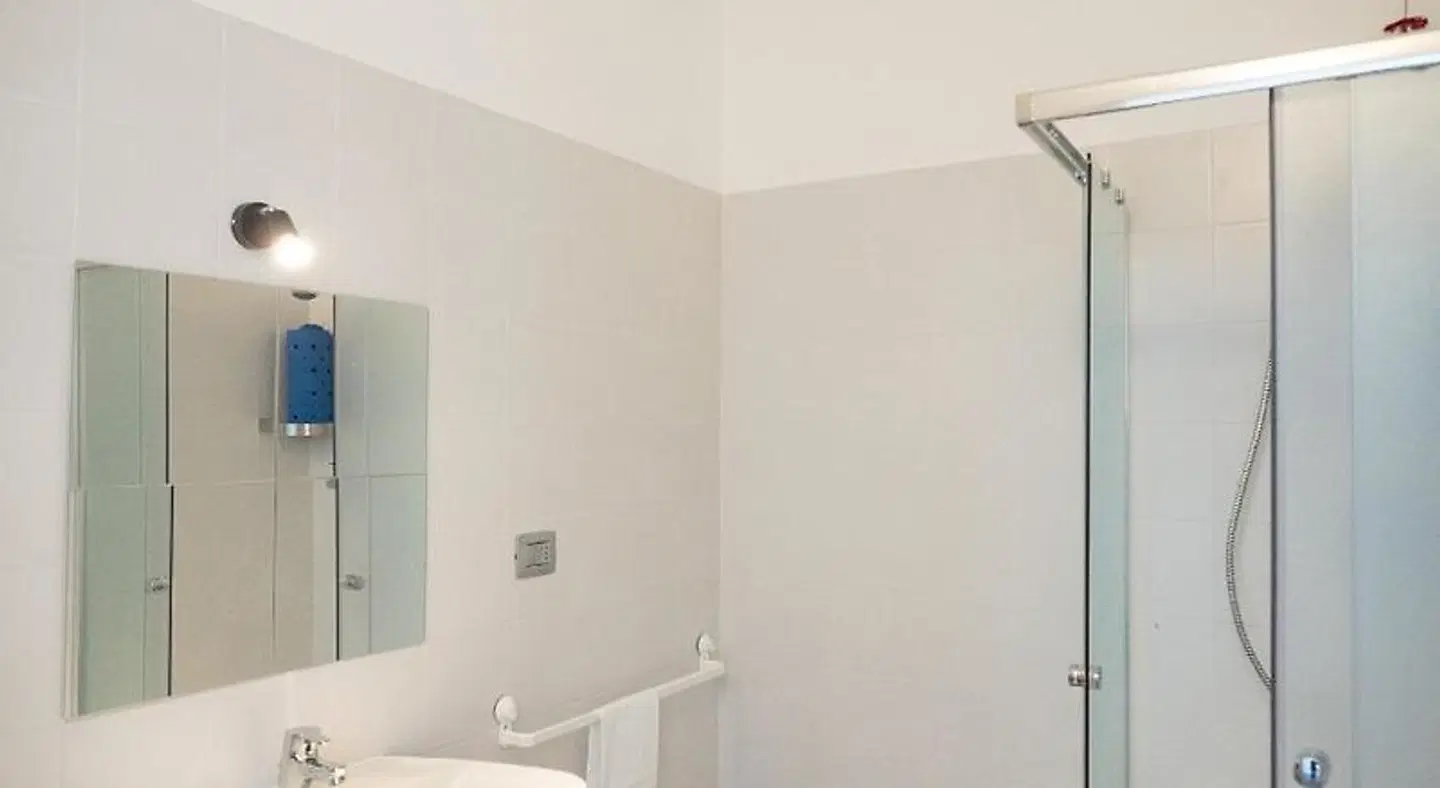 Lake Como Beach Lodge & Hostel Badezimmer