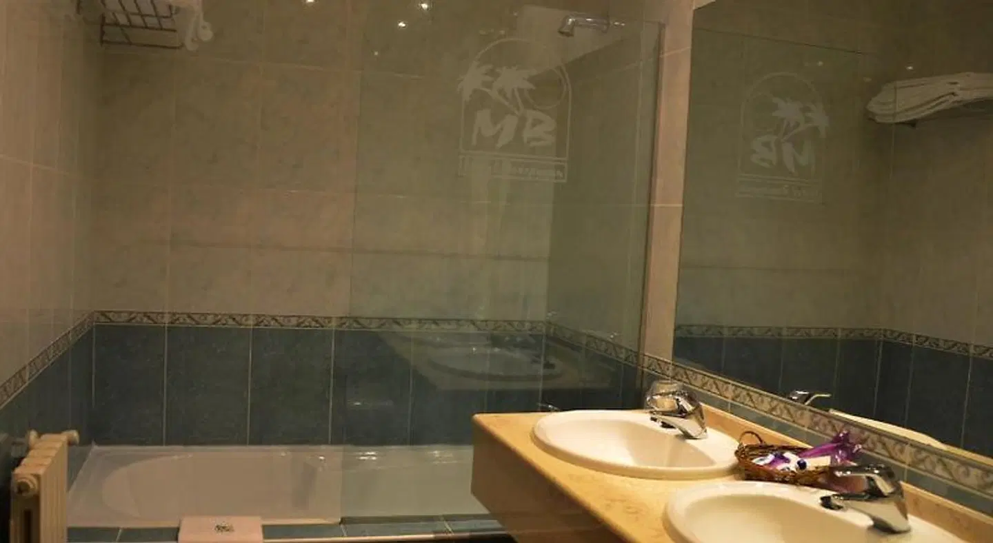 Motel Bracancún Badezimmer