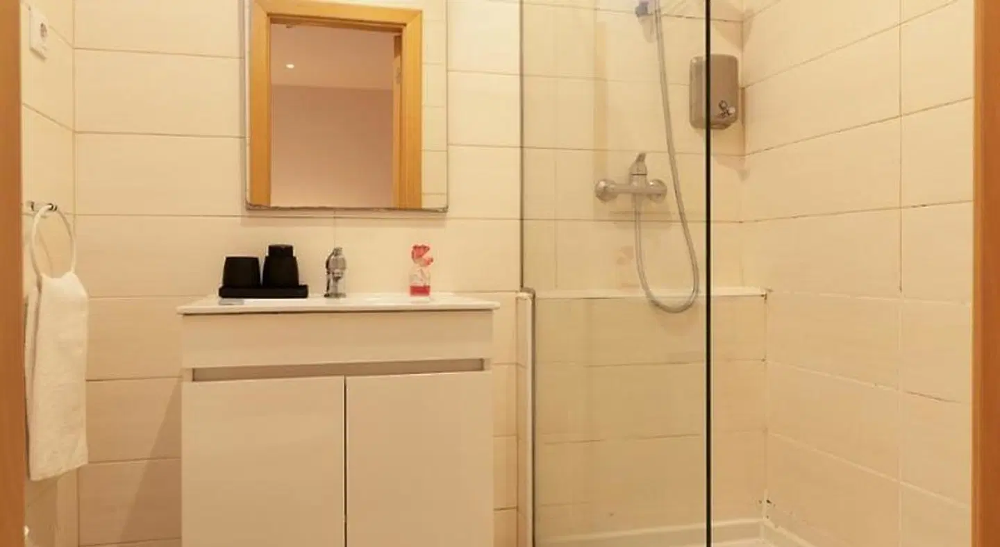 Peach Hostel & Suites Badezimmer