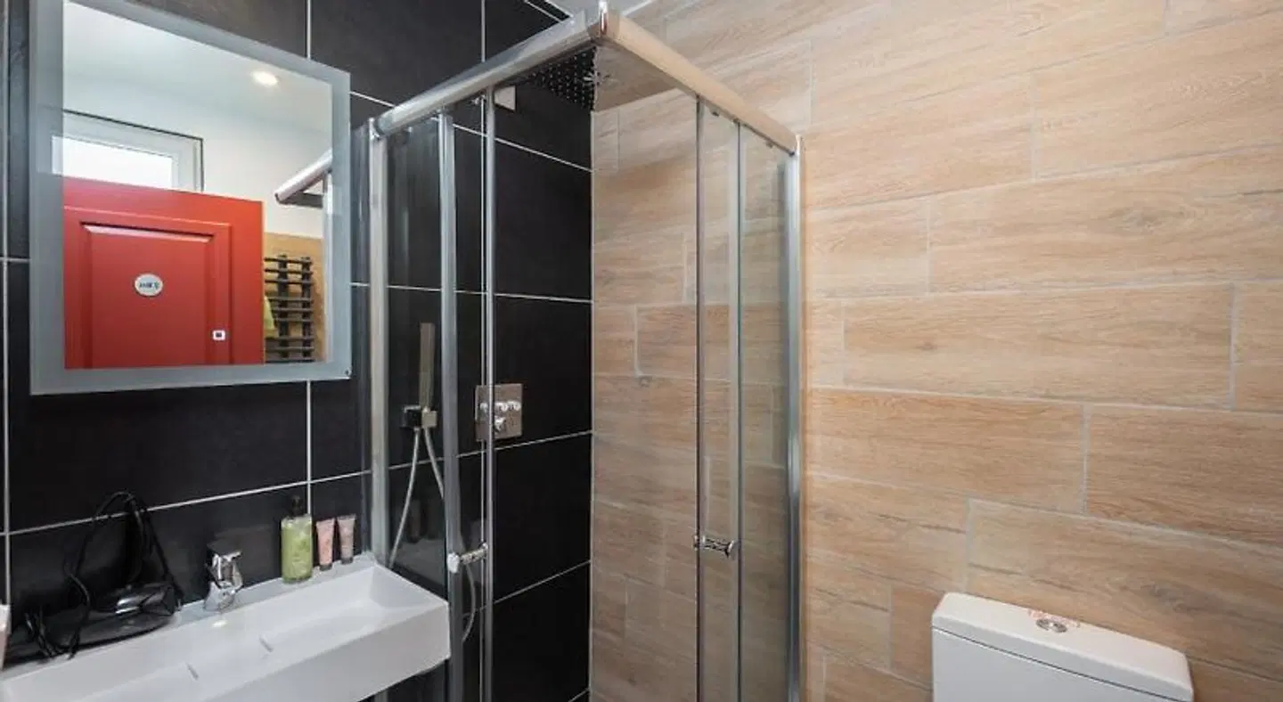 Hotel Une Chambre en Ville Badezimmer