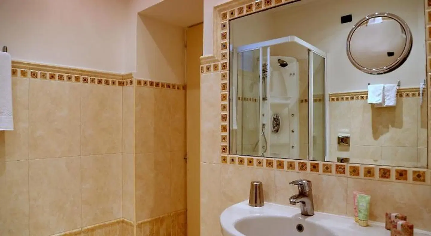 Capitolium Rooms Badezimmer