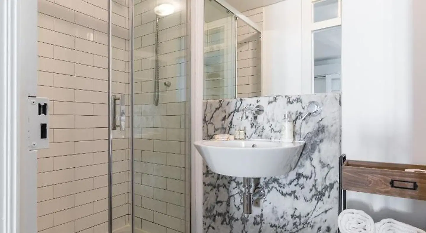 Alma Apartments | RentExperience Badezimmer