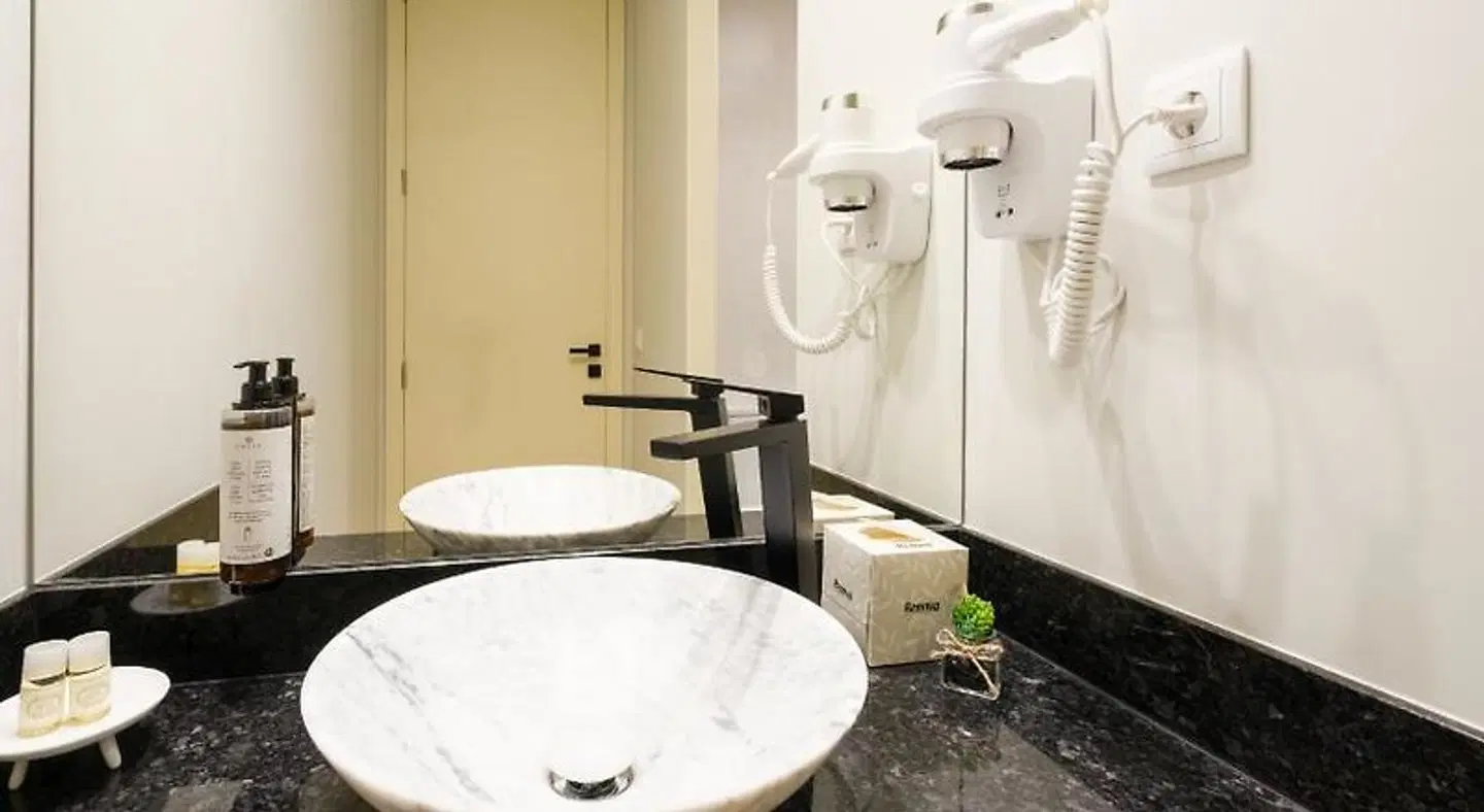 Porto Suites do Marquês Badezimmer