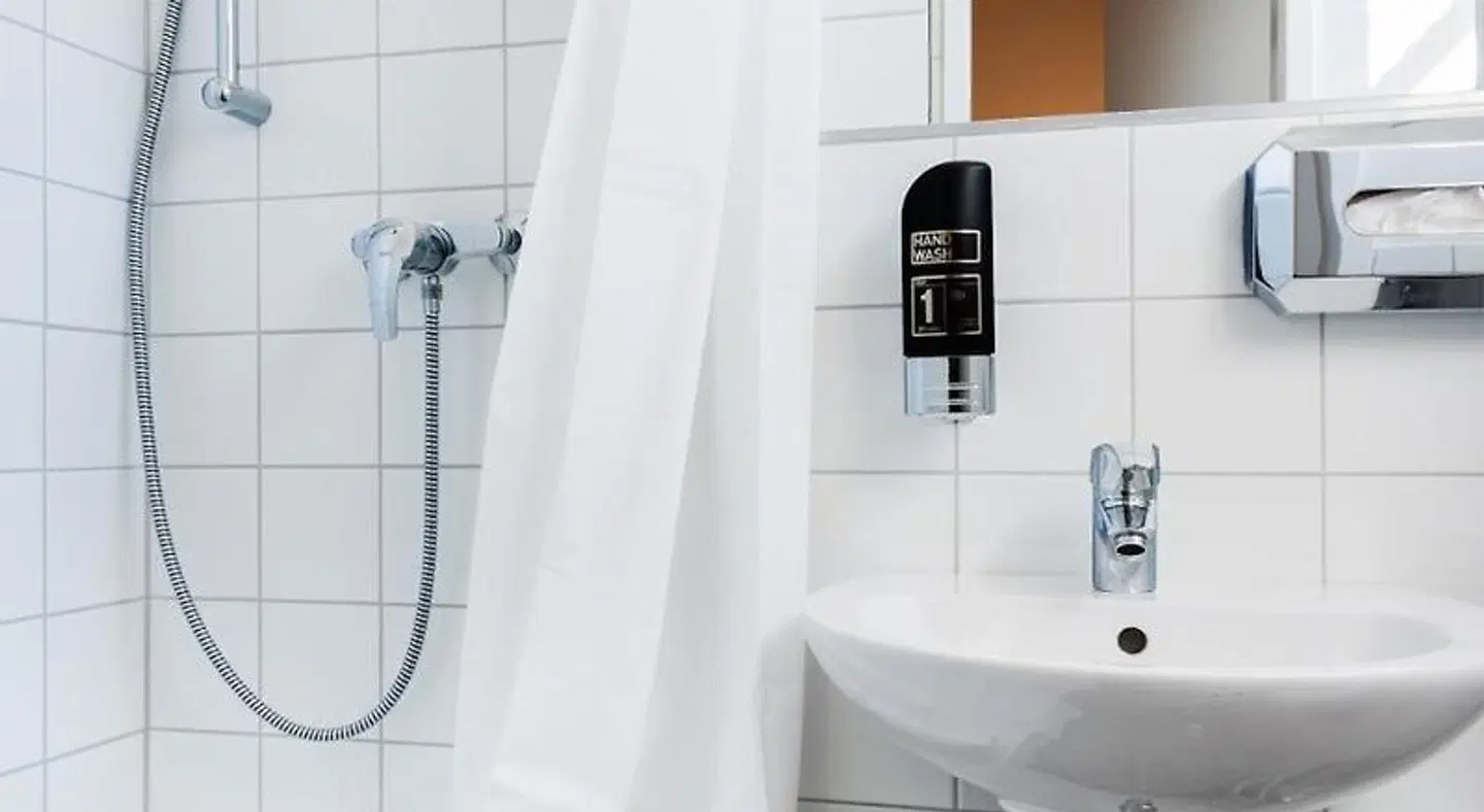 Apple City Hotel Badezimmer