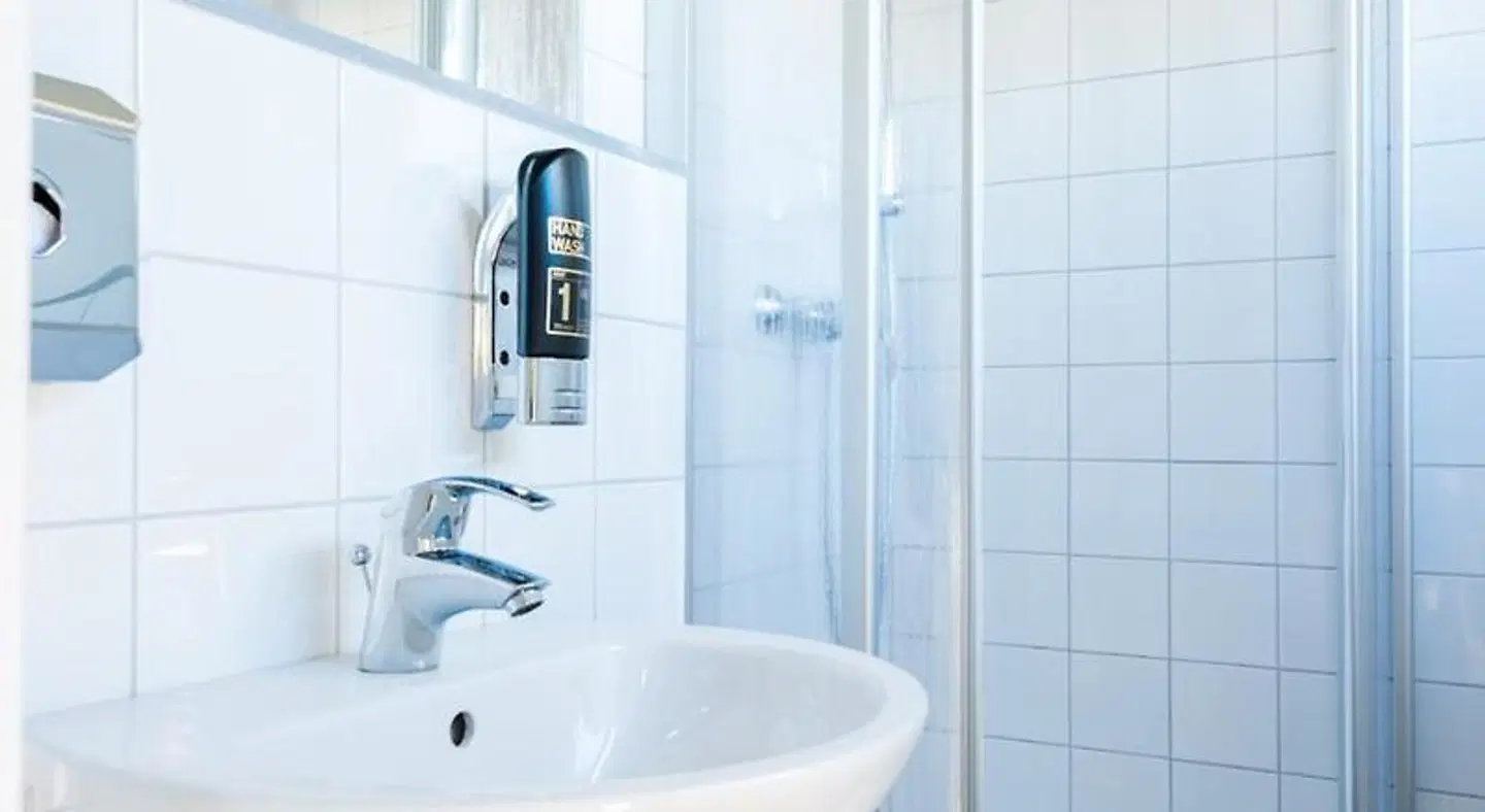 Apple City Hotel Badezimmer