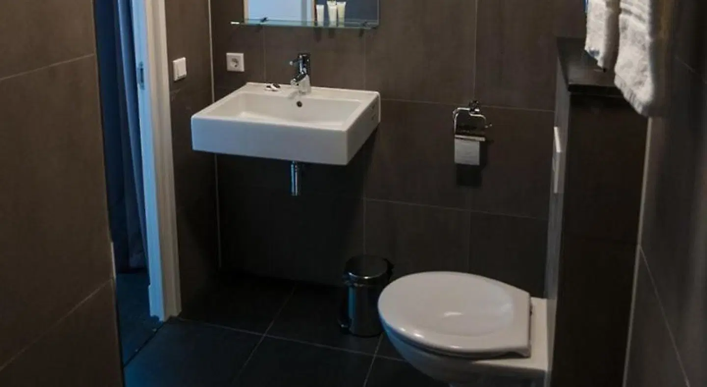 Hotel Fine Harmony Badezimmer