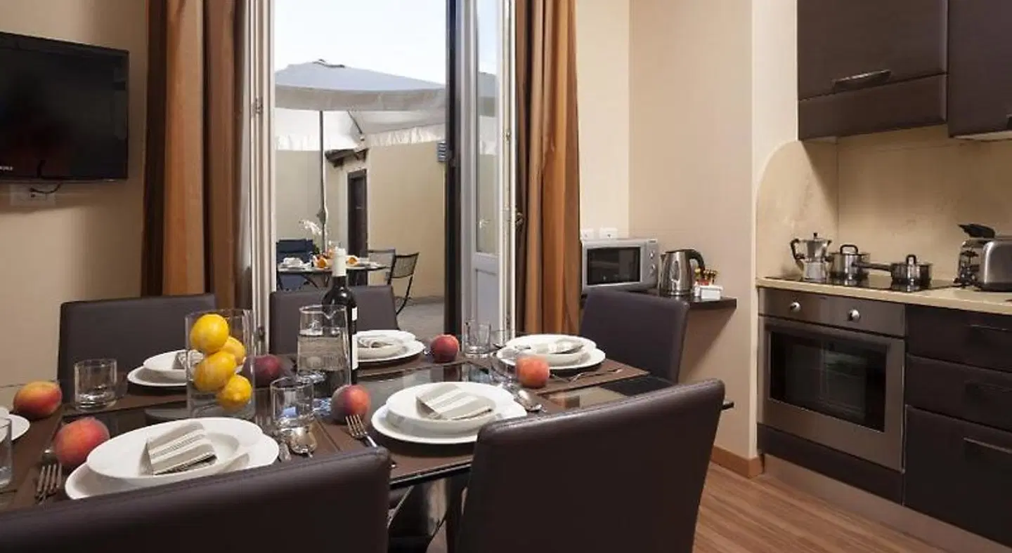 Trianon Borgo Pio Aparthotel Badezimmer