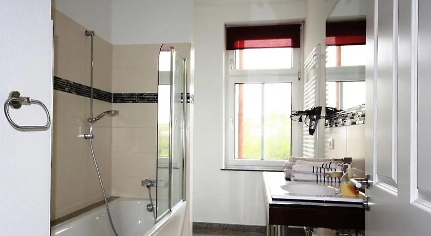 VacApps L.E. Holiday Suites in Leipzig Badezimmer