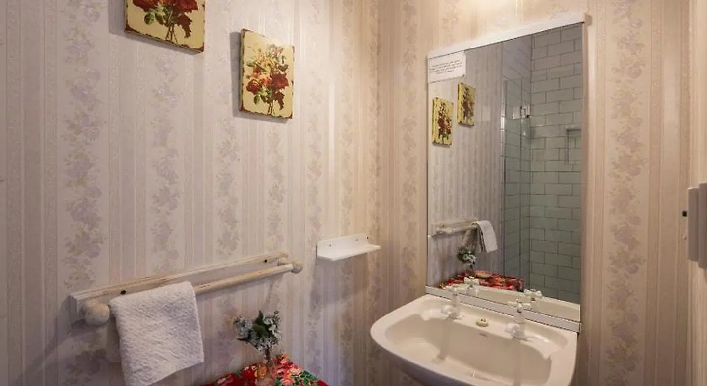 Settlers Cottage Motel Badezimmer