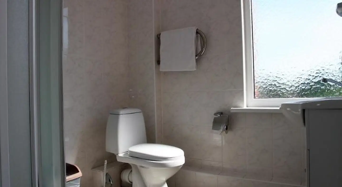 Hotel Dobele Badezimmer