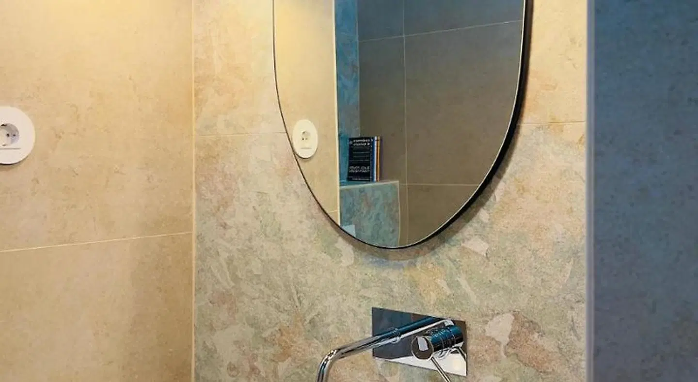 Oryza Guest House & Suites Badezimmer