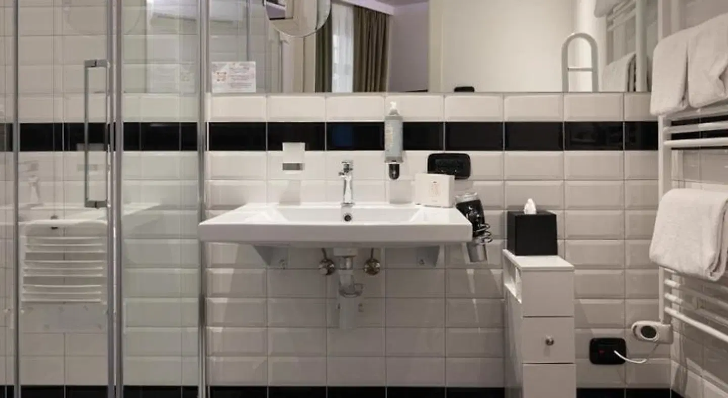 Stadt Hotel Città Badezimmer