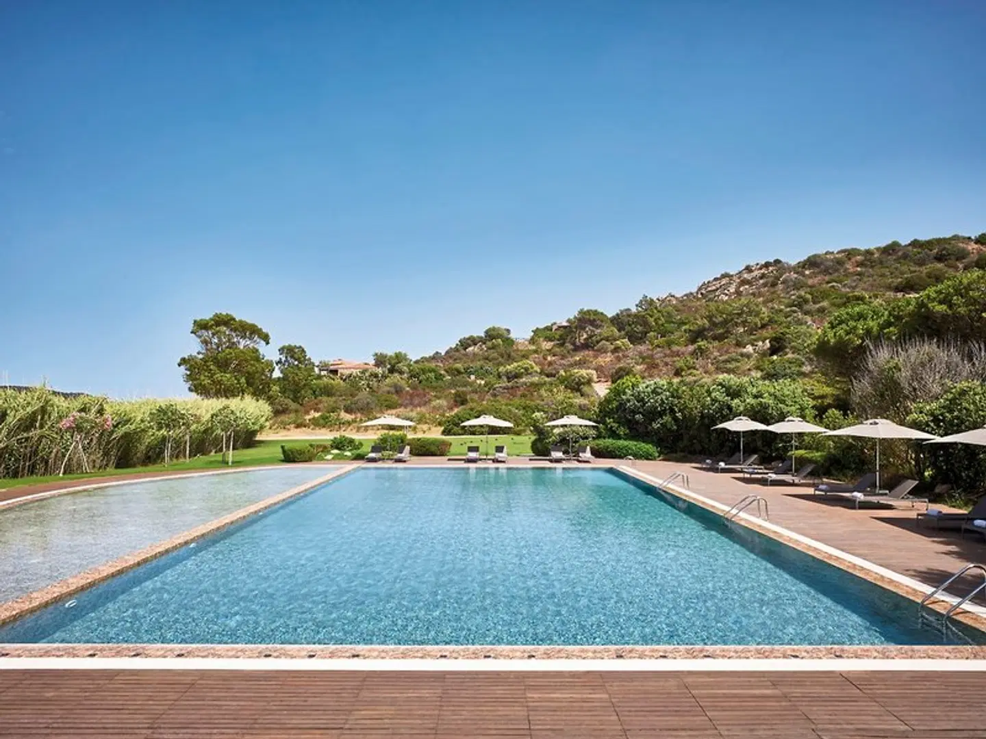 Baia di Chia Resort Sardinia, Curio Collection by Hilton OUTDOOR_POOL