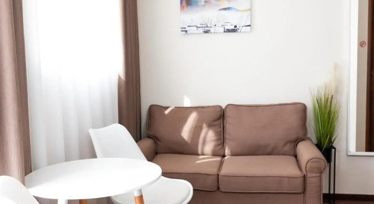 City Plaza Apartments & Rooms ROOM_EXAMPLE