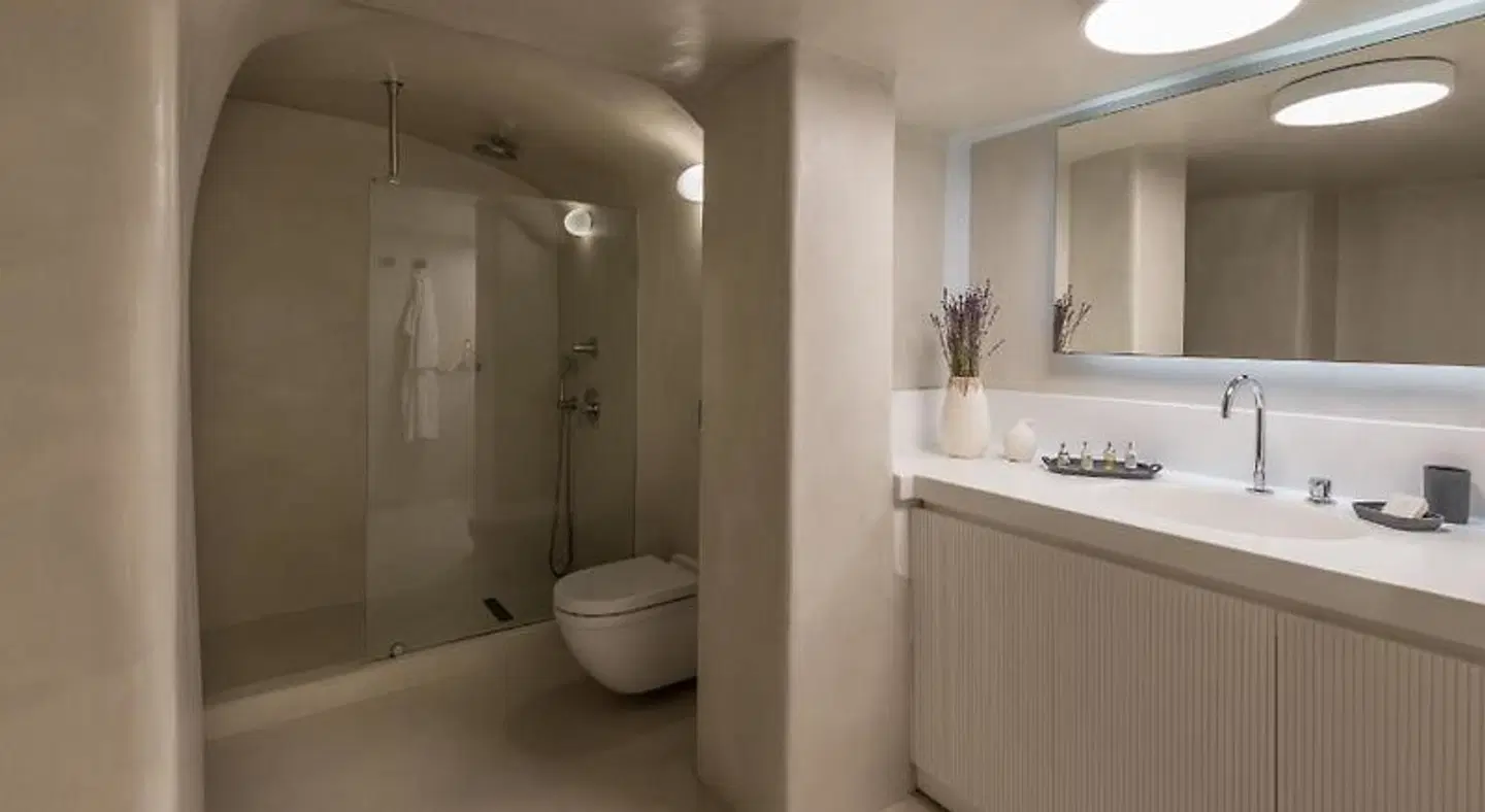 Enigma Apartments and Suites Badezimmer