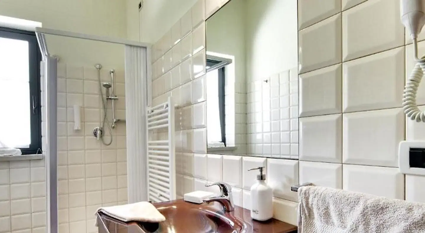 Casale Romano Resort Badezimmer