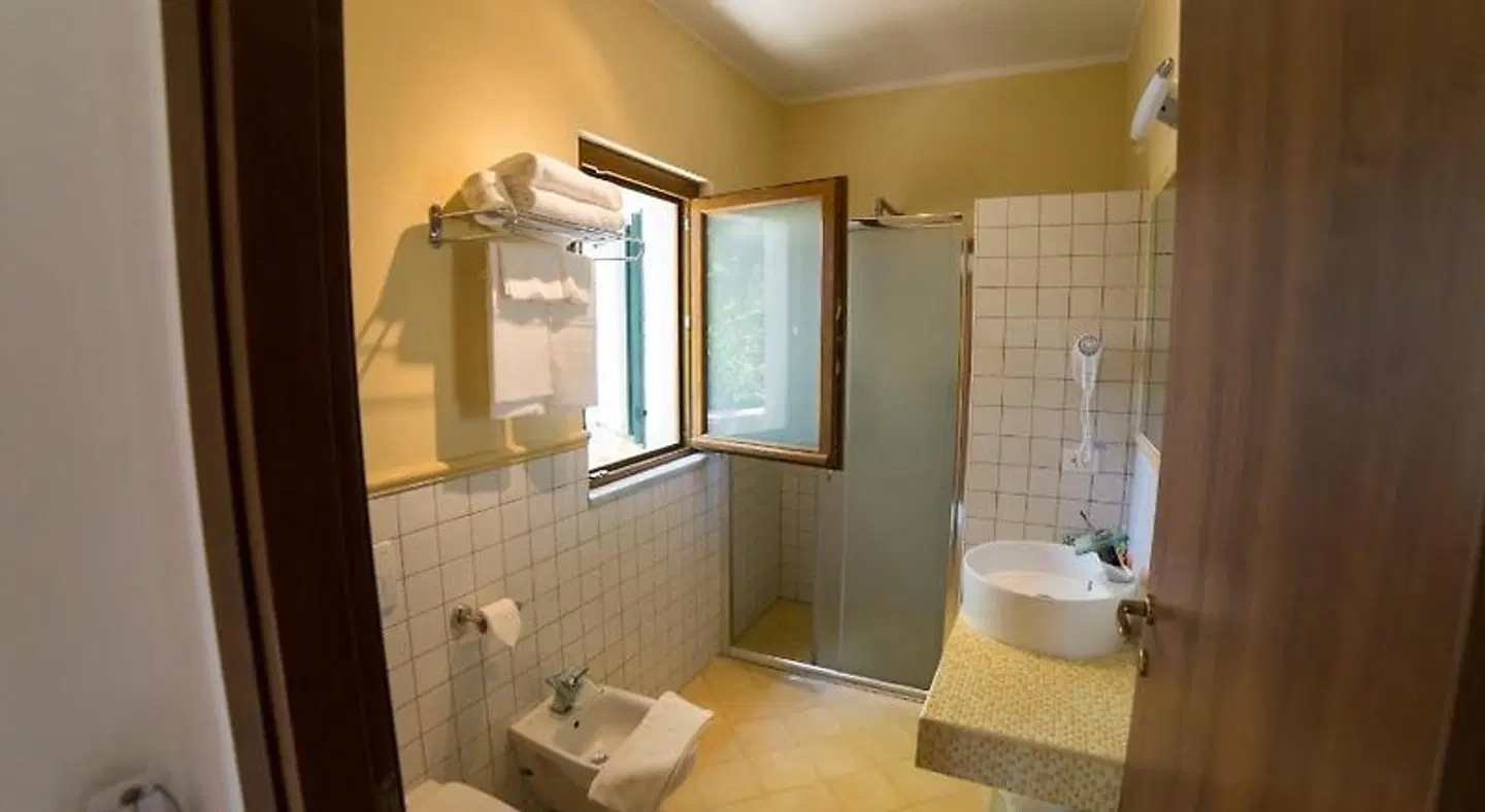Hotel Capo Sud Badezimmer
