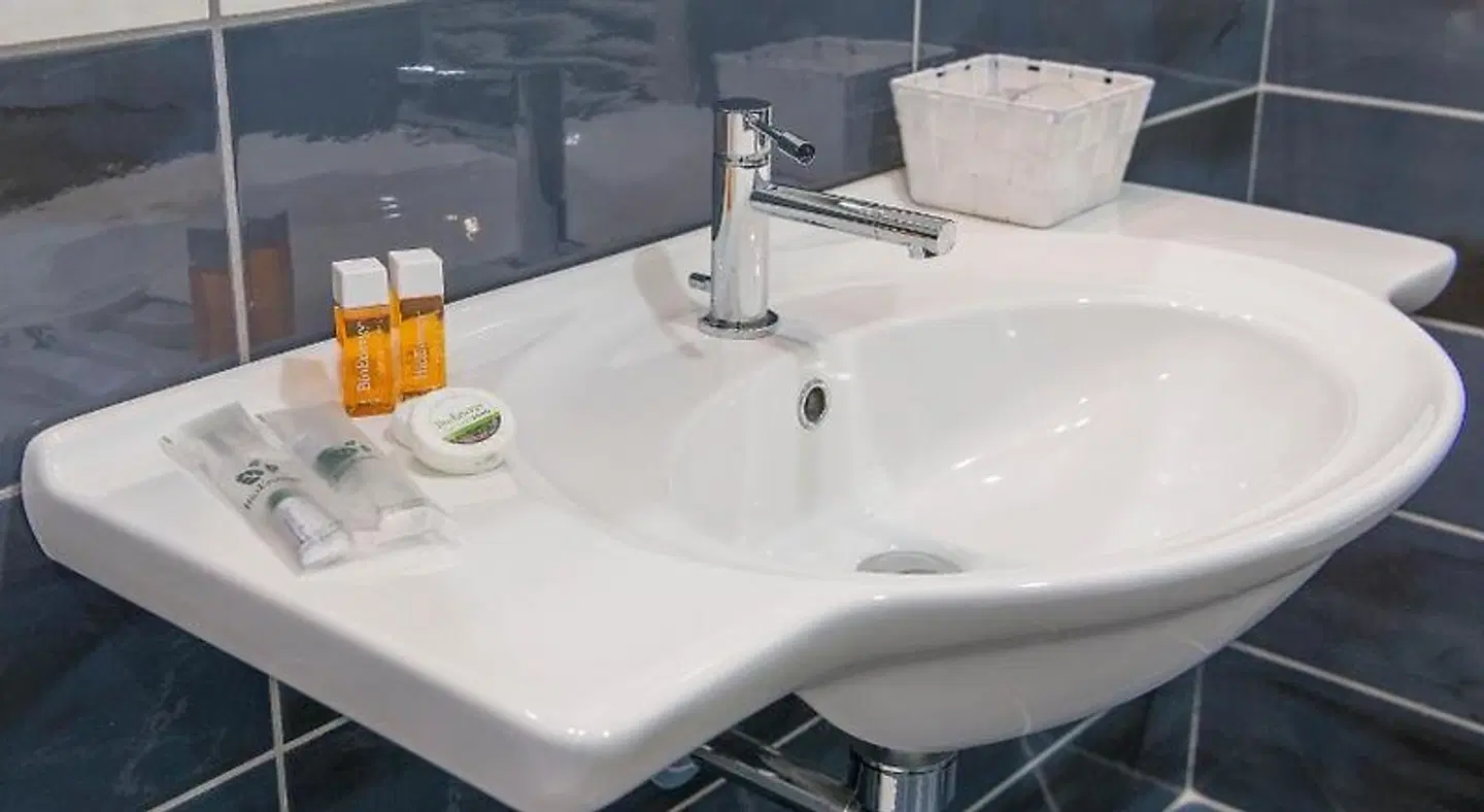 Hotel America Badezimmer