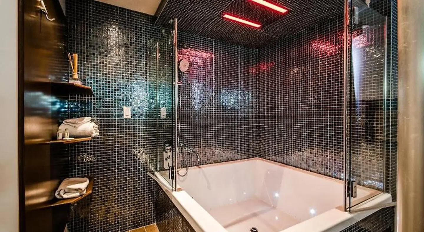 Olux Hotel-Motel-Suites Badezimmer