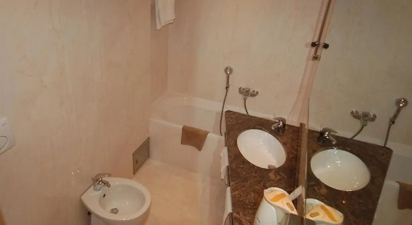 Astoria Hotel Italia Badezimmer