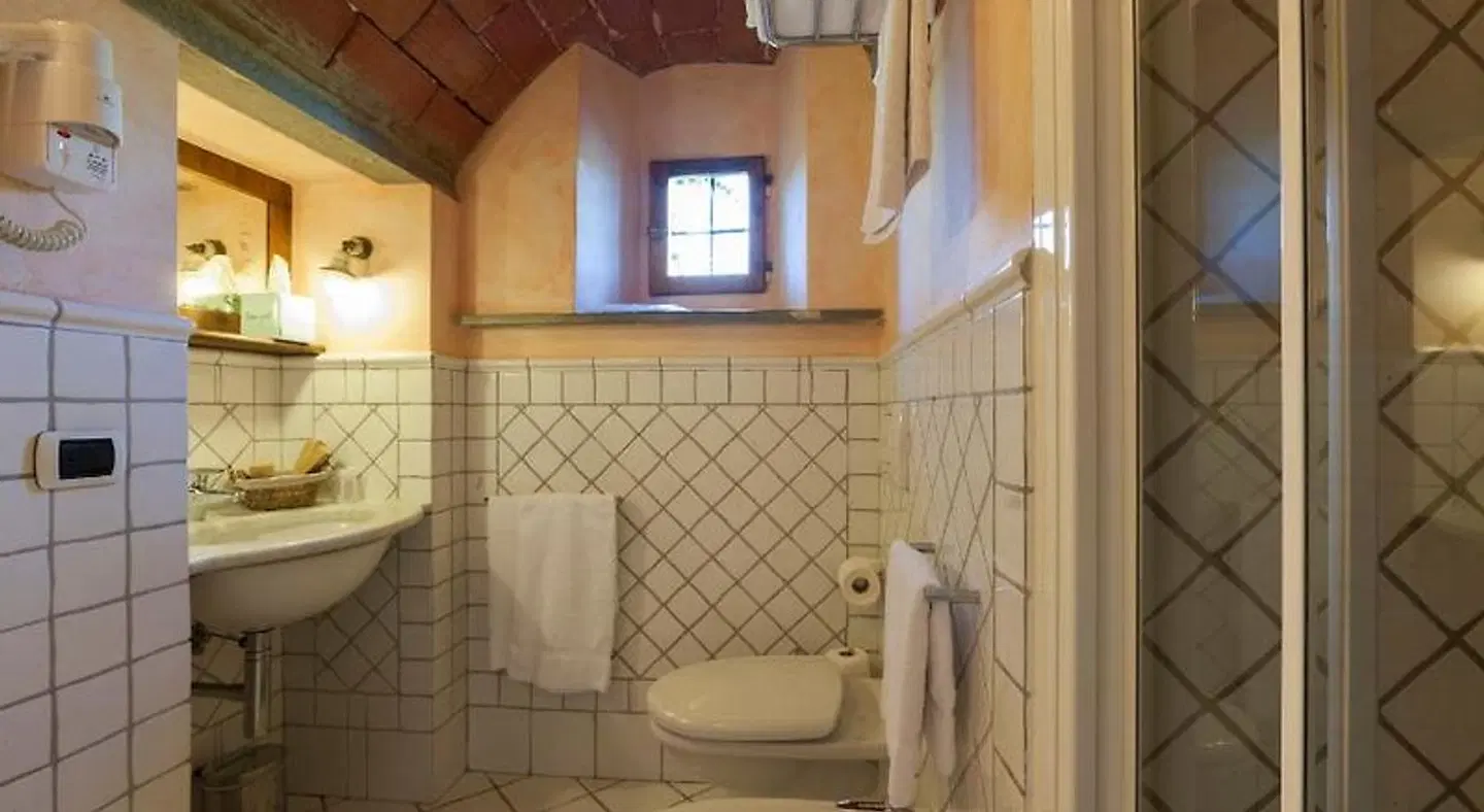 Relais Poggio Borgoni Badezimmer
