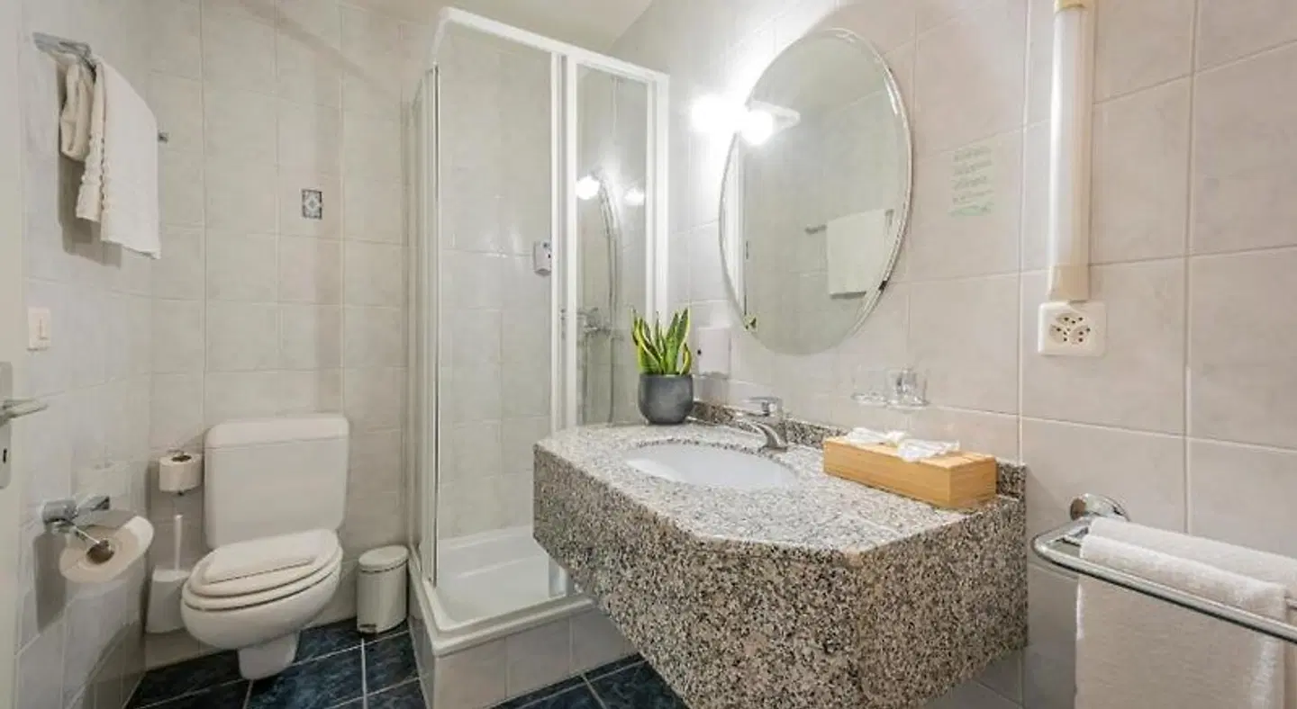 Hotel du Cheval Blanc Badezimmer