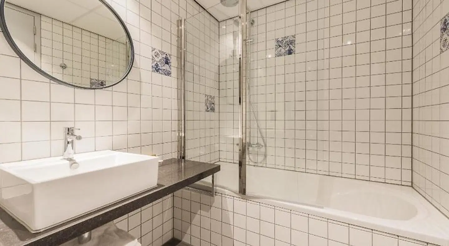 Urban Lodge Hotel Badezimmer