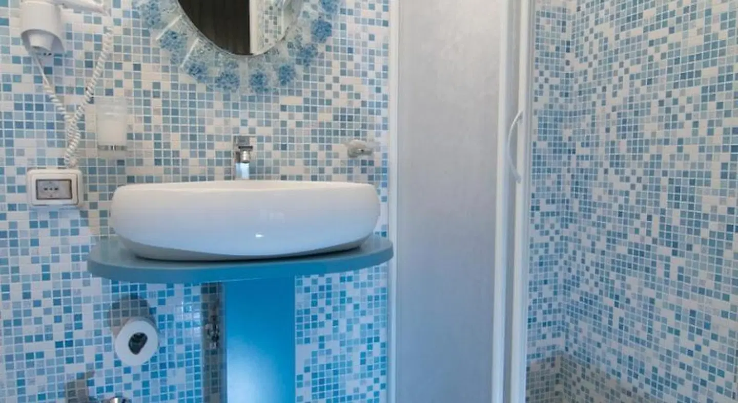 Hotel Velus Badezimmer