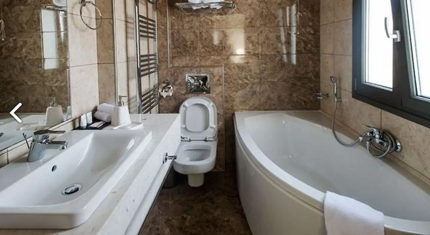 Theasis Hotel Badezimmer