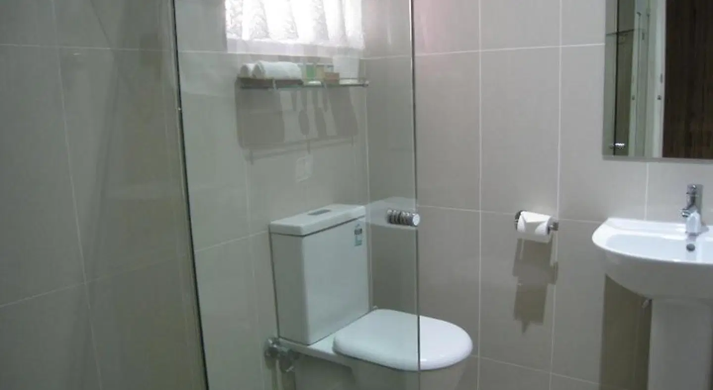 Country Lodge Motor Inn Badezimmer