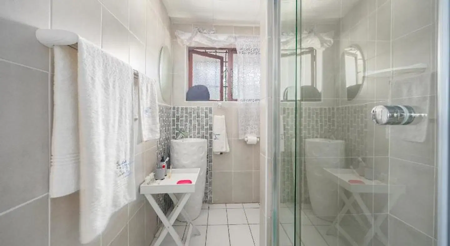 Beachcomber Bay Guest House Badezimmer