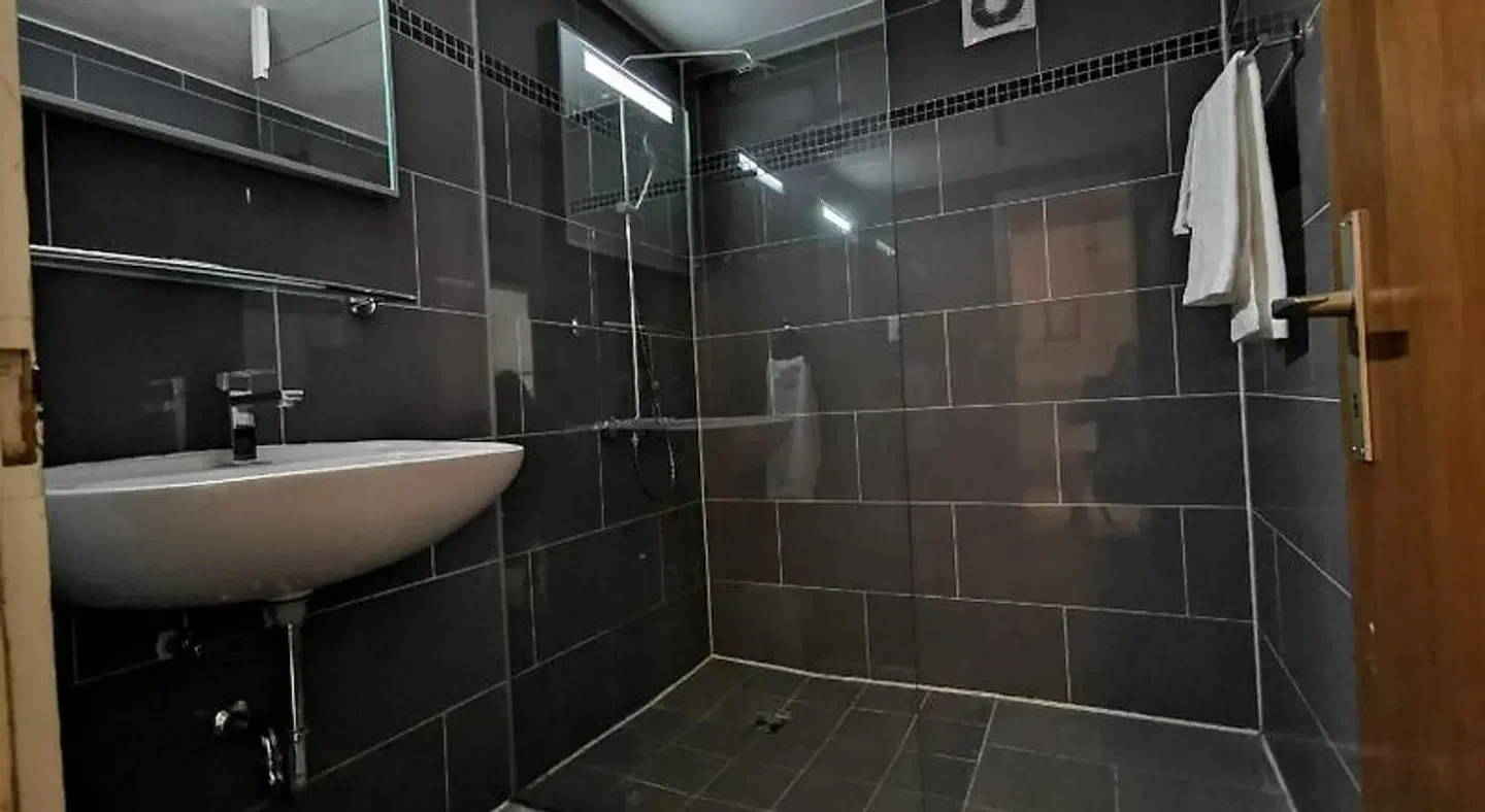 Downtown Apartment Badezimmer