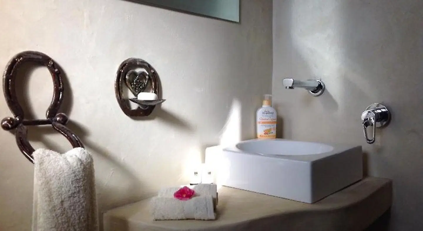 T'Niqua Stable Inn Badezimmer