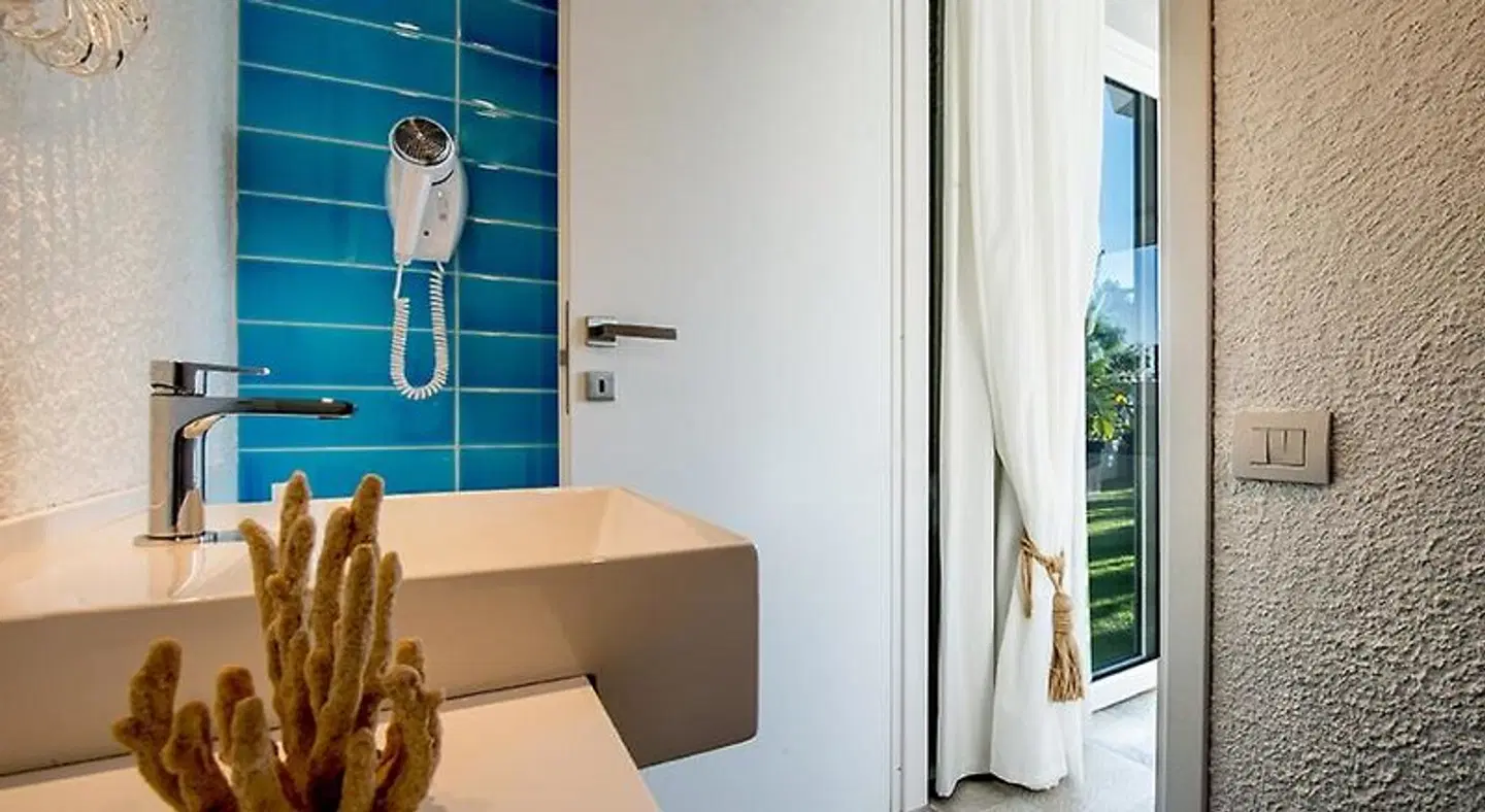 Boutique Hotel Capo Blu Badezimmer