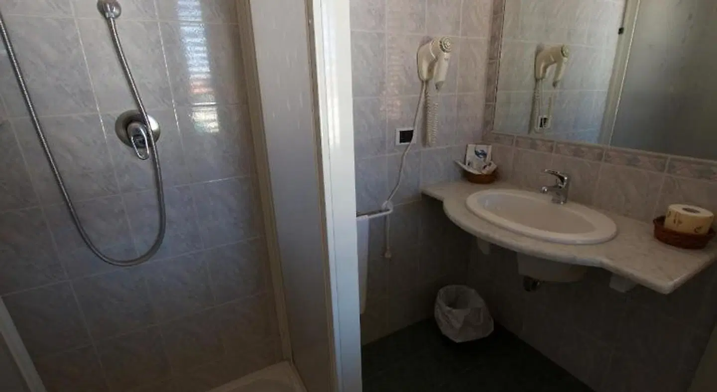 Hotel Centrale Badezimmer