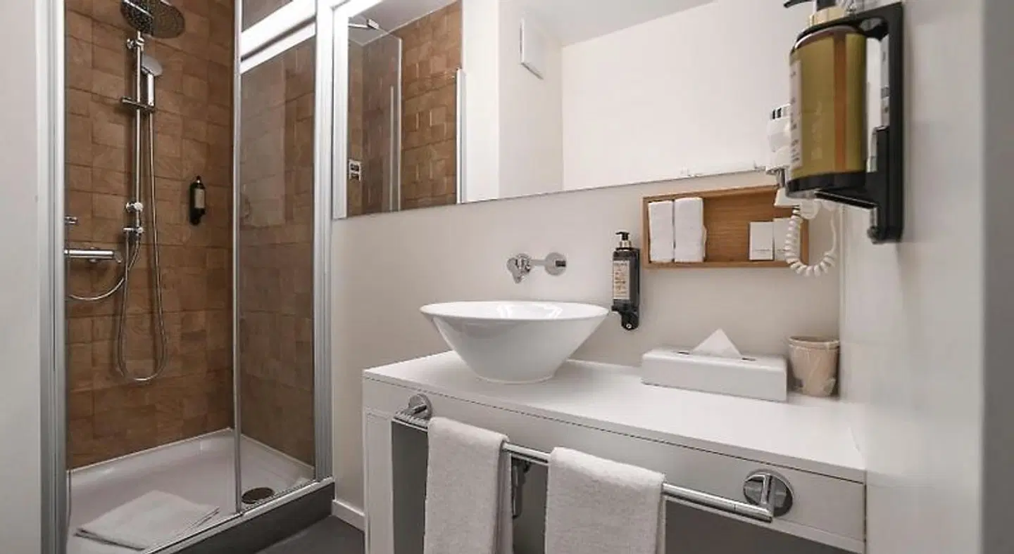 Home Swiss Hotel (ex Le Grenil) BATHROOM